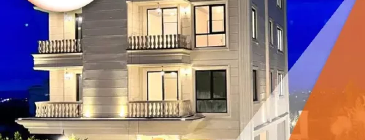نمای سفید نور پردازی شده آپارتمان 4 طبقه در سرخرود و محوطه سازی سرسبز آن 887954