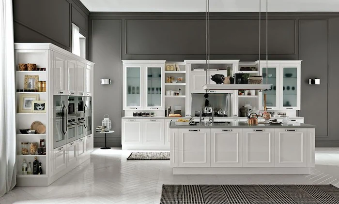 کابینت های سفید رنگ نئوکلاسیک به کار رفته در آشپزخانه 165484210